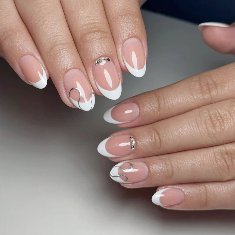 Elegant French Tip Press-On Nail Set with Decorative Accents Stornfield