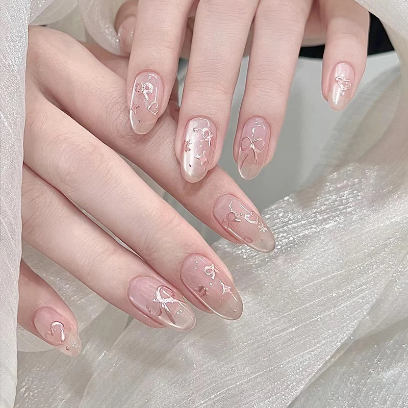 Elegant Artistic Press-On Nail Art with Bow & Heart Designs Stornfield
