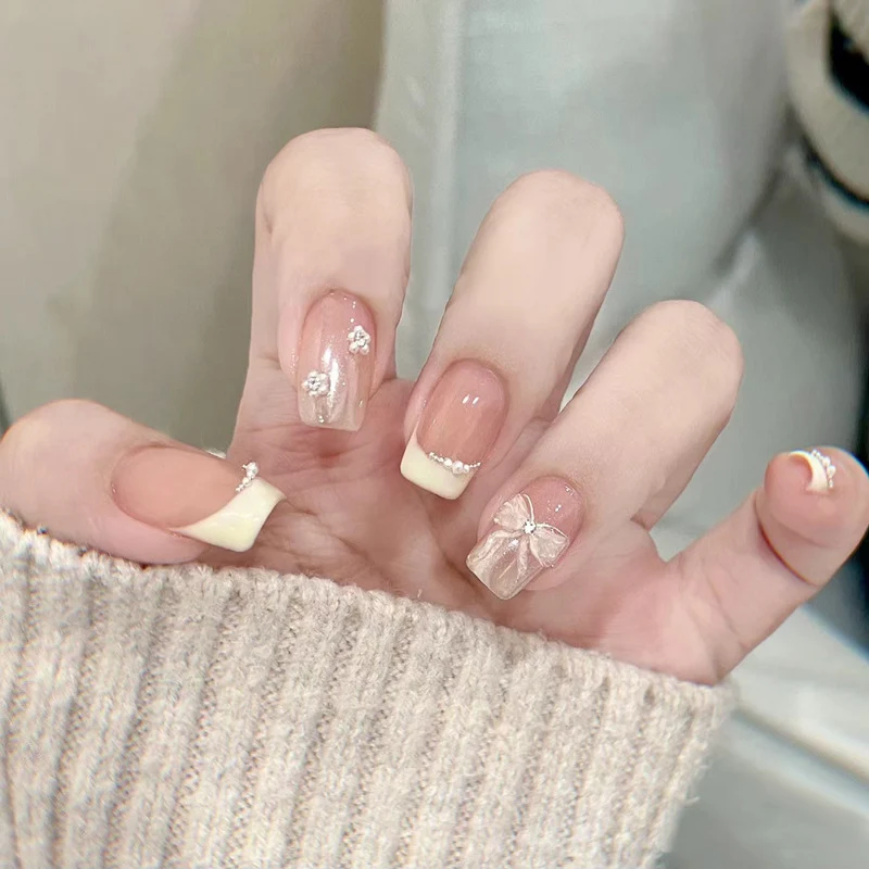 Artistic Nail Extensions with Decorative Elements Stornfield