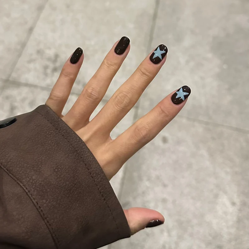 Artistic Nail Art with Star Designs Stornfield