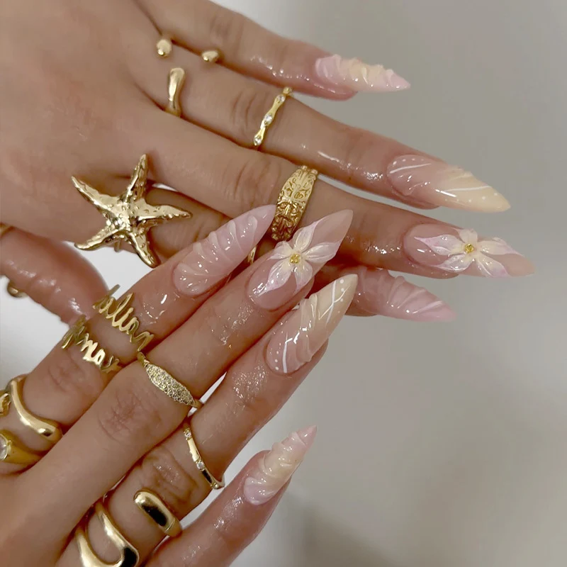 Artistic Long-Lasting Press-On Nail Extensions with Floral Patterns Stornfield