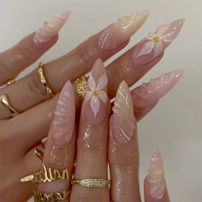 Artistic Long-Lasting Press-On Nail Extensions with Floral Patterns Stornfield