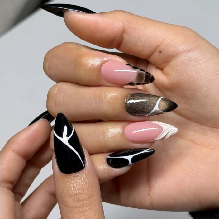 Artistic Almond-Shaped Nail Art Stornfield