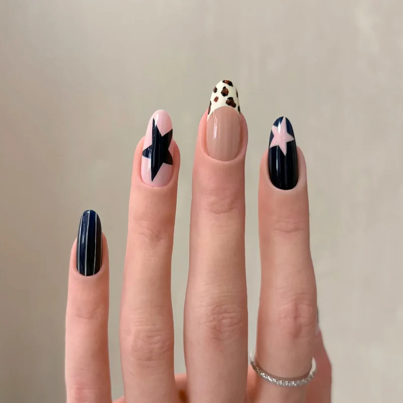 Artistic Press-On Nail Set with Unique Star and Animal Print Designs Stornfield