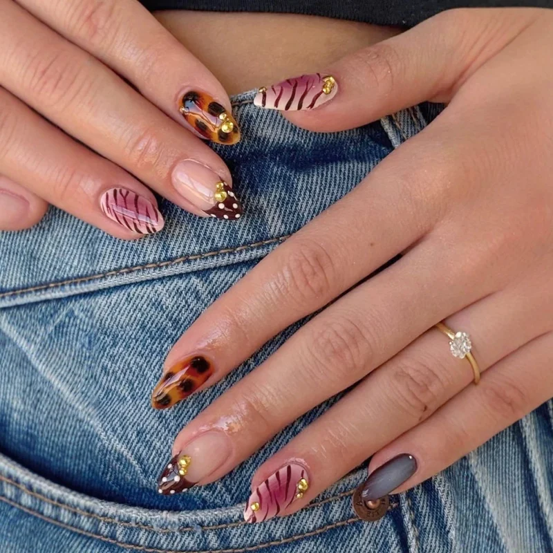 Artistic Press-On Nail Set with Unique Patterns and Embellishments Stornfield