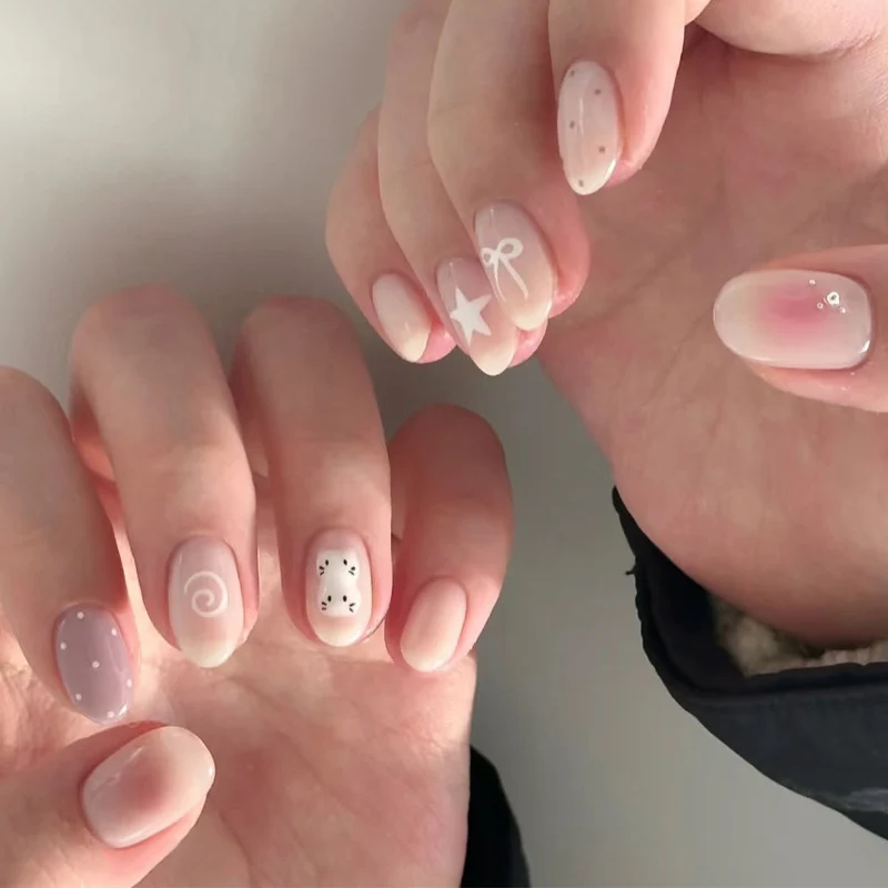 Artistic Press-On Nail Set with Unique Decorative Elements Stornfield