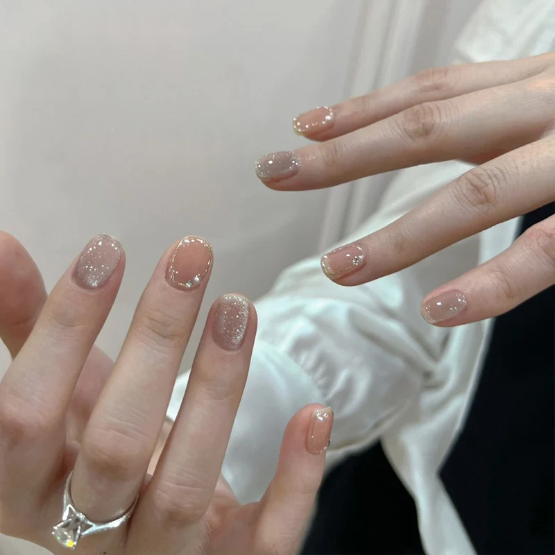 Artistic Press-On Nail Set with Glittery Star Accents Stornfield