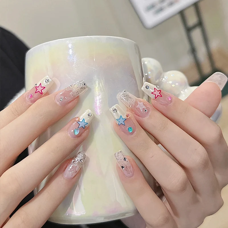 Artistic Press-On Nail Set with Glittery Star Accents Stornfield