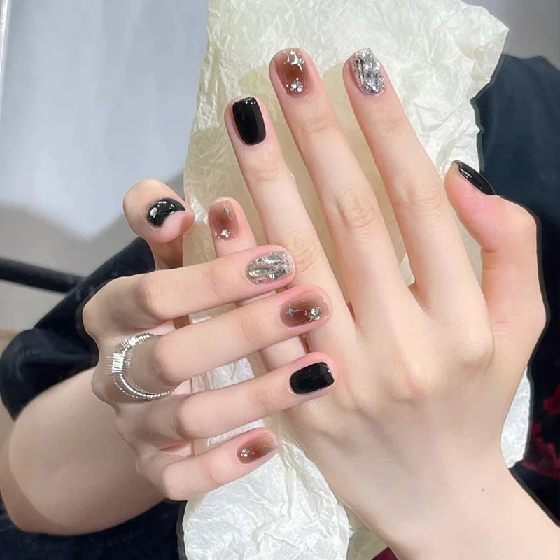 Artistic Press-On Nail Set with Glittery Star Accents Stornfield