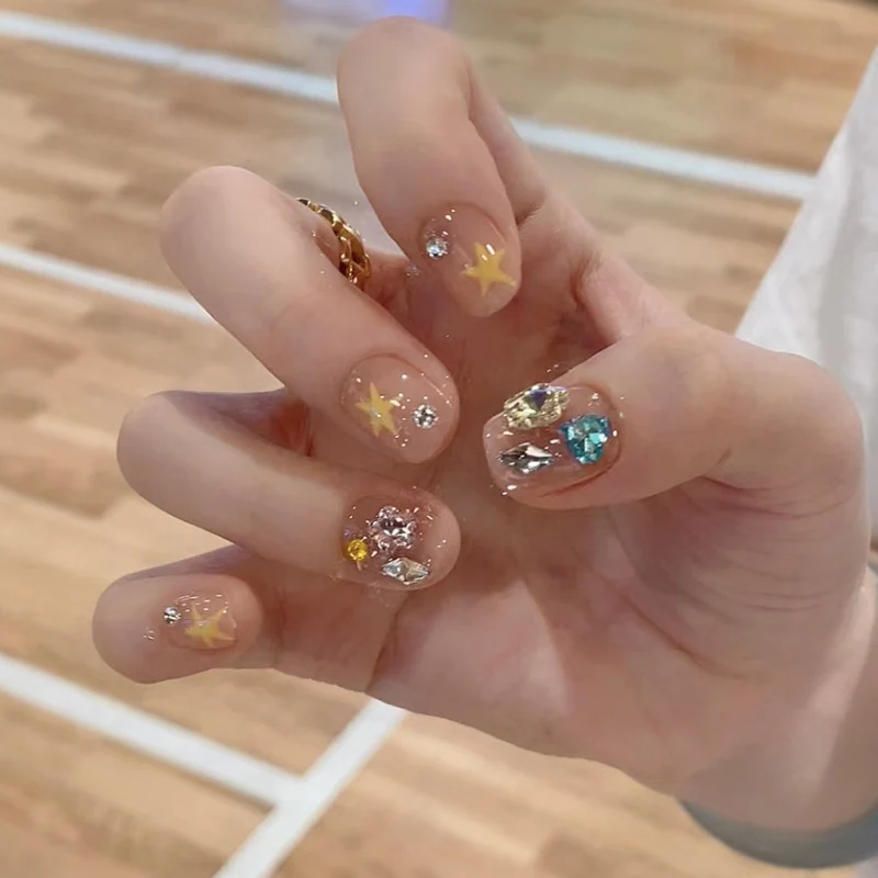 Artistic Press-On Nail Set with Gemstone and Star Accents Stornfield