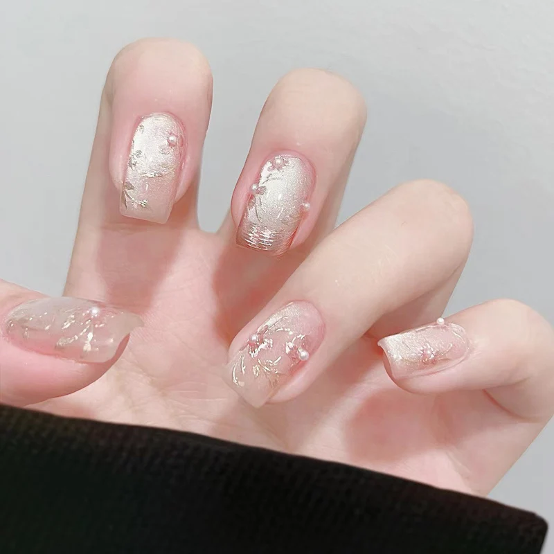 Artistic Press-On Nail Set with Elegant Floral and Pearl Accents Stornfield