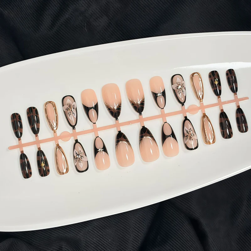 Artistic Press-On Nail Set with Elegant Floral and Abstract Designs Stornfield