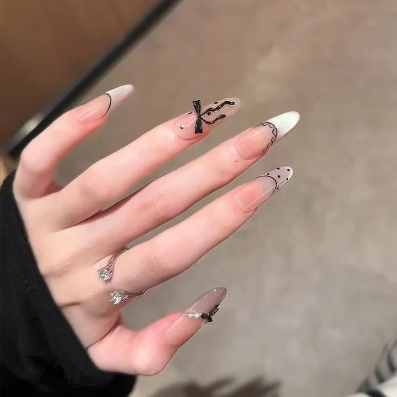 Artistic Press-On Nail Set with Elegant Bow and Pattern Details Stornfield