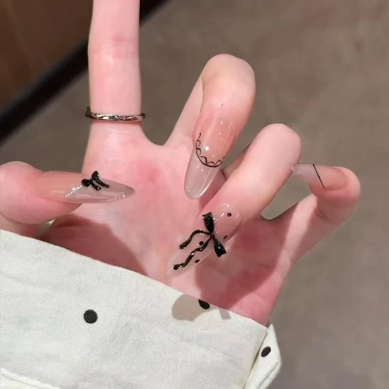 Artistic Press-On Nail Set with Elegant Bow and Pattern Details Stornfield