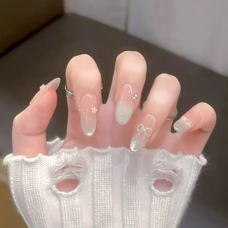 Artistic Press-On Nail Set with Bow and Floral Details Stornfield