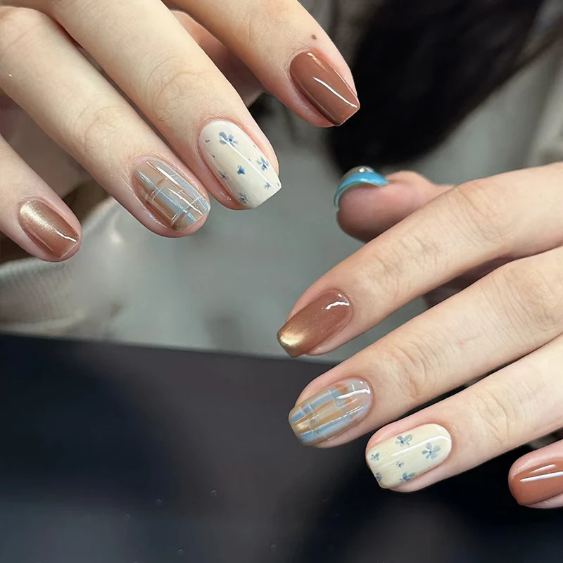 Artistic Press-On Nail Set with Botanical and Plaid Designs Stornfield