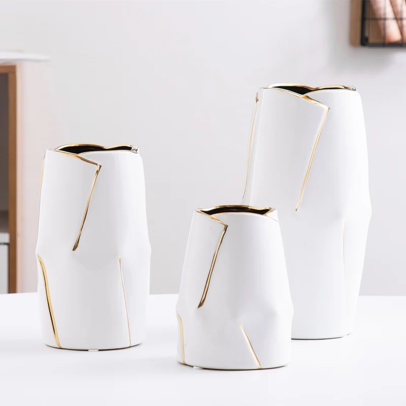 Decorative ceramic vase with golden accents Stornfield
