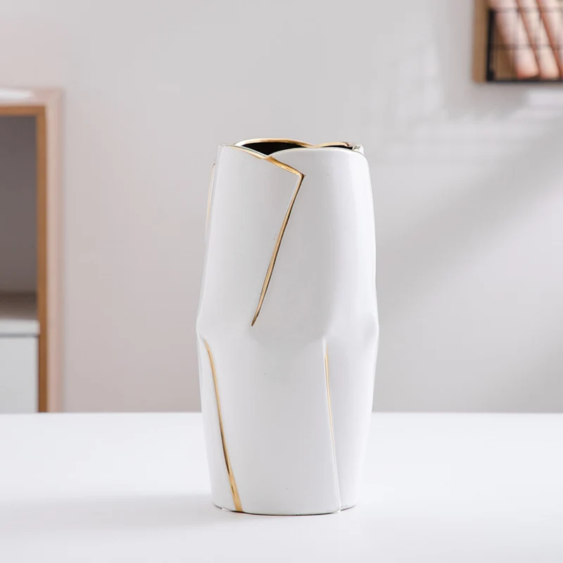 Decorative ceramic vase with golden accents Stornfield