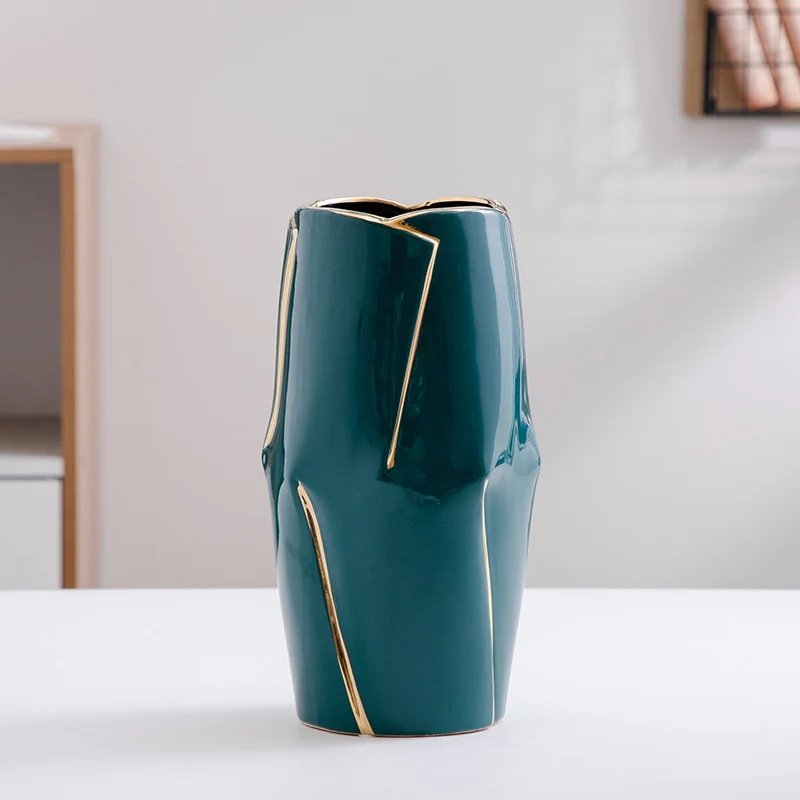 Decorative ceramic vase with golden accents Stornfield