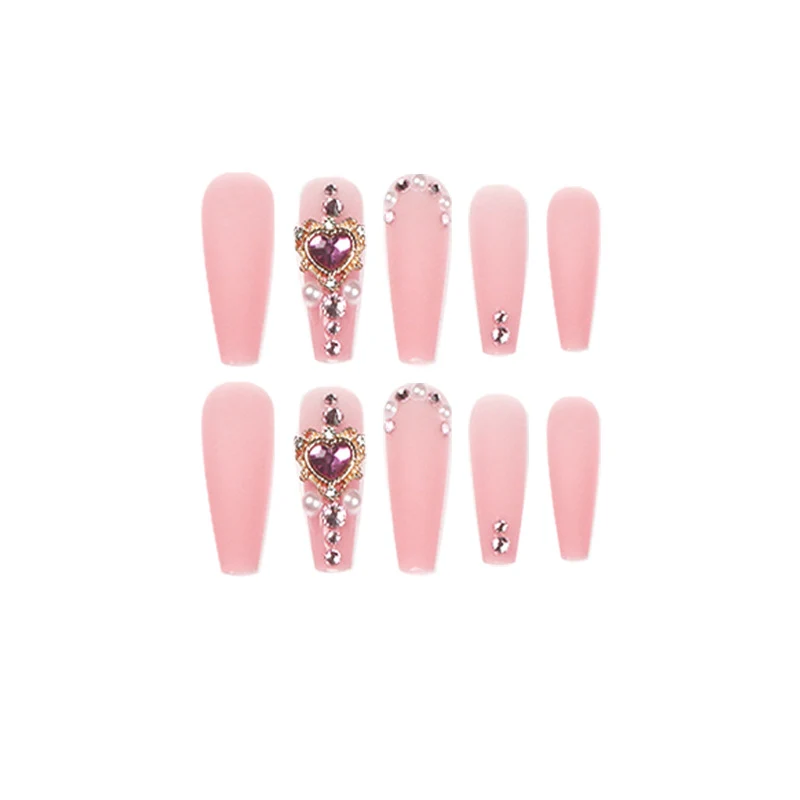 Creative artificial nails with heart-shaped decorative accents Stornfield