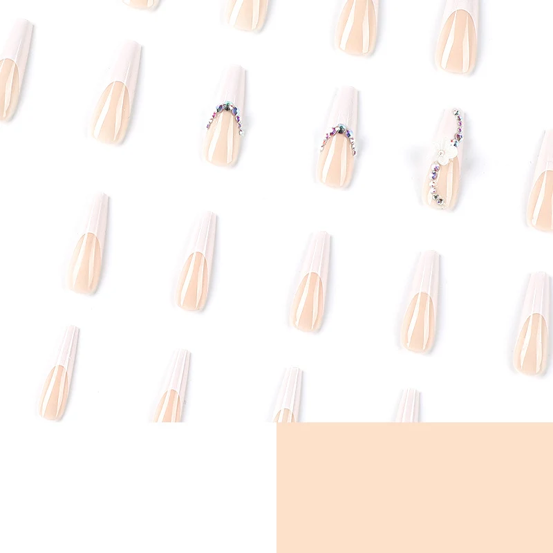 Creative artificial nails with elegant rhinestone and floral accents Stornfield