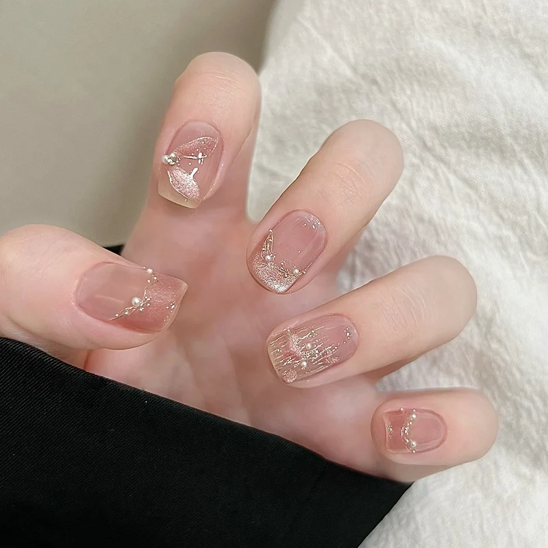 Handmade art nails with delicate embellishments Stornfield