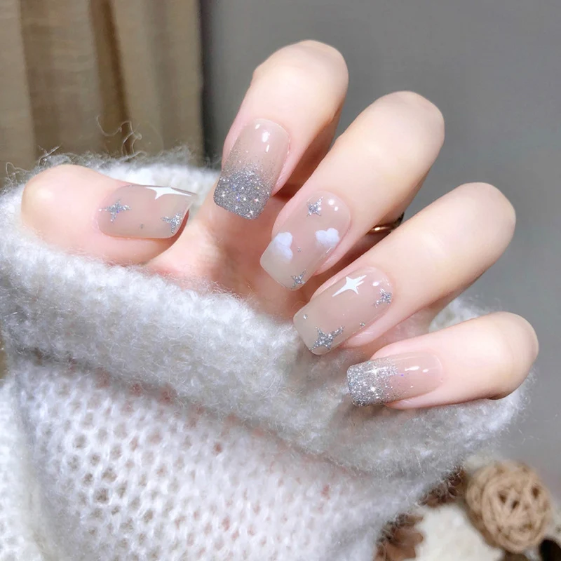 Glittering nail extensions with creative jewelry design Stornfield