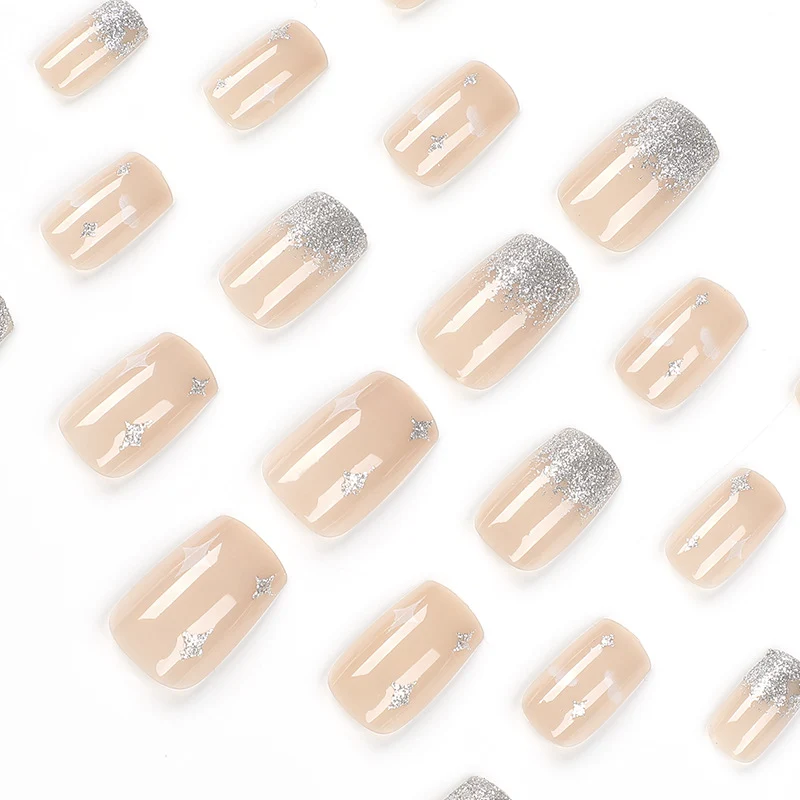 Glittering nail extensions with creative jewelry design Stornfield
