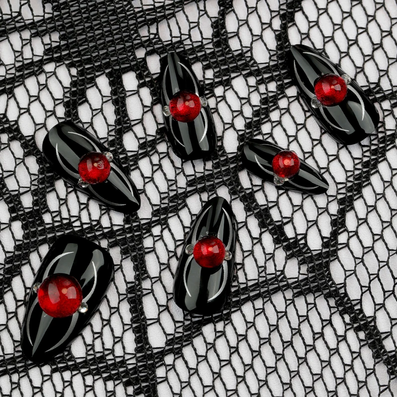 Glamorous stiletto nails with radiant accents Stornfield