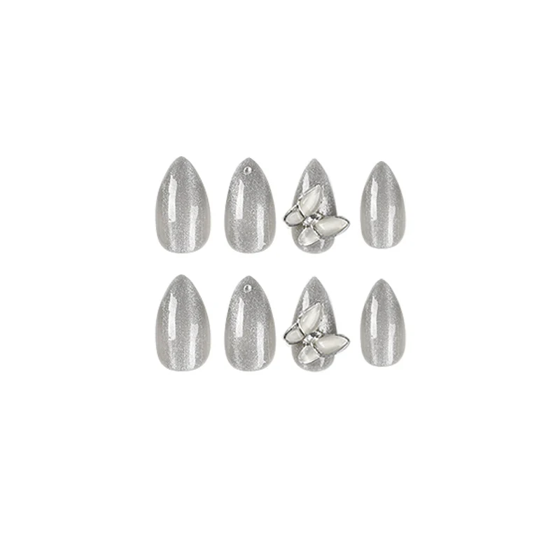 Glamorous stiletto nails with radiant glitter and elegant 3D design Stornfield