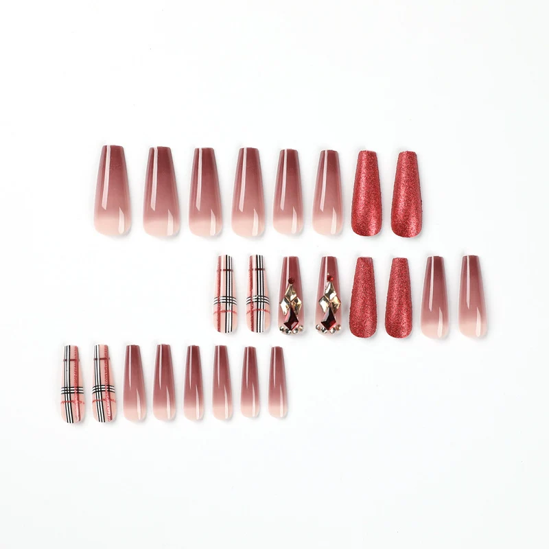 Glamorous stiletto nails with extravagant design and glitter accents Stornfield