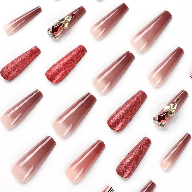 Glamorous stiletto nails with extravagant design and glitter accents Stornfield