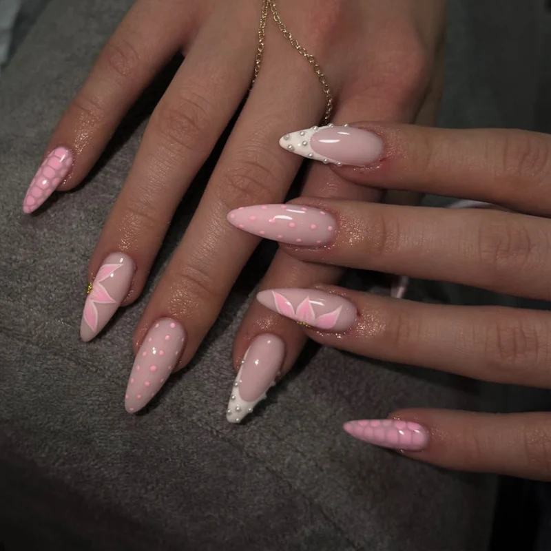 Glamorous stiletto nails with elegant star design Stornfield