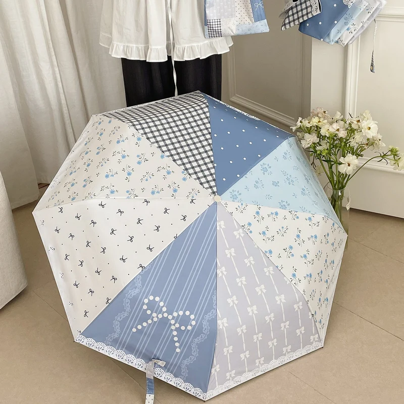 Damer paraply i romantisk patchwork-design Luvikno