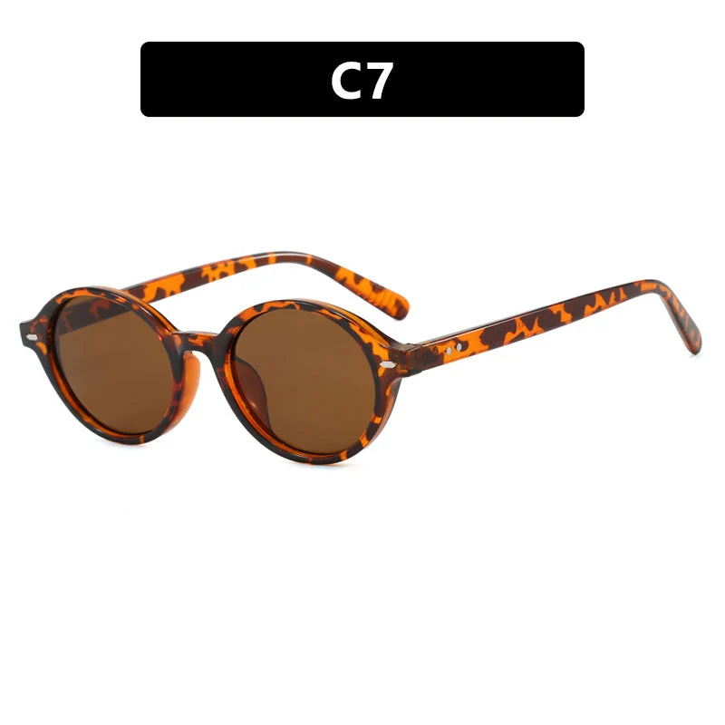 Dame rund solbrille med moderne design og polariserte glass Luvikno