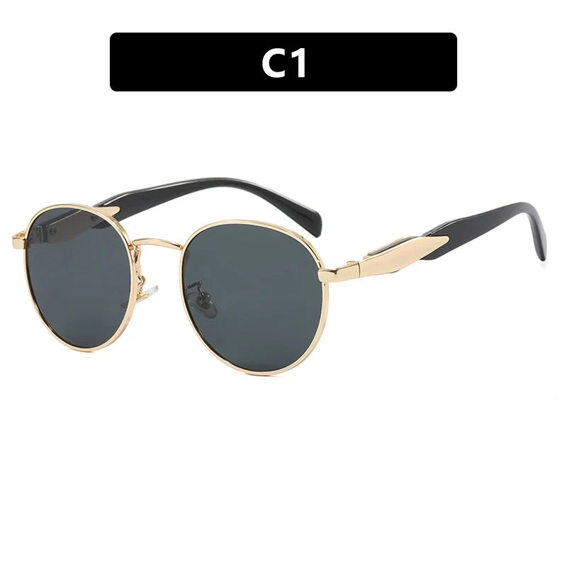 Dame rund solbrille med elegant, gyllen ramme og UV-beskyttelse Luvikno