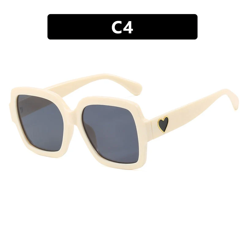Dame firkantet solbrille med leken hjerte detalj Luvikno