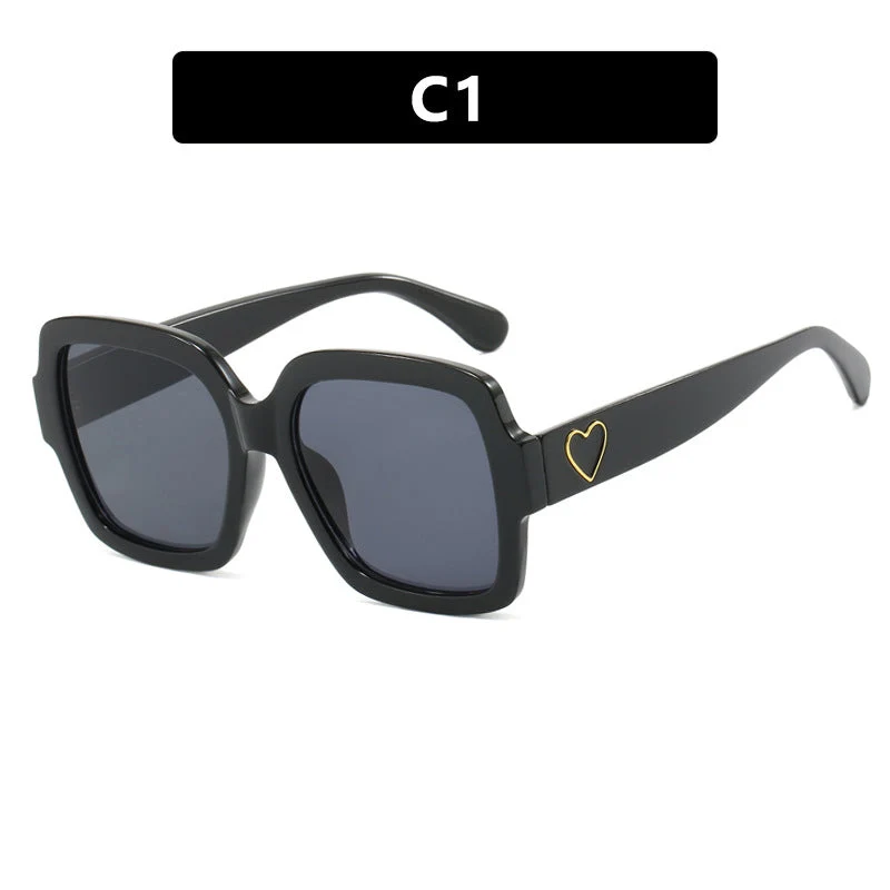 Dame firkantet solbrille med leken hjerte detalj Luvikno