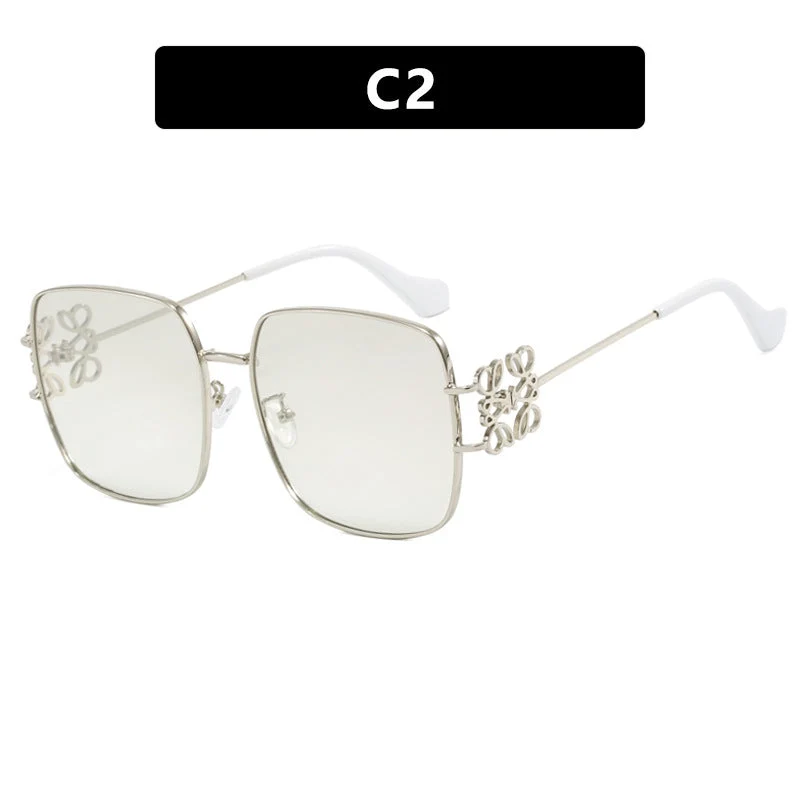 Dame kvadratisk solbrille med filigran design og luksuriøs metallramme Luvikno