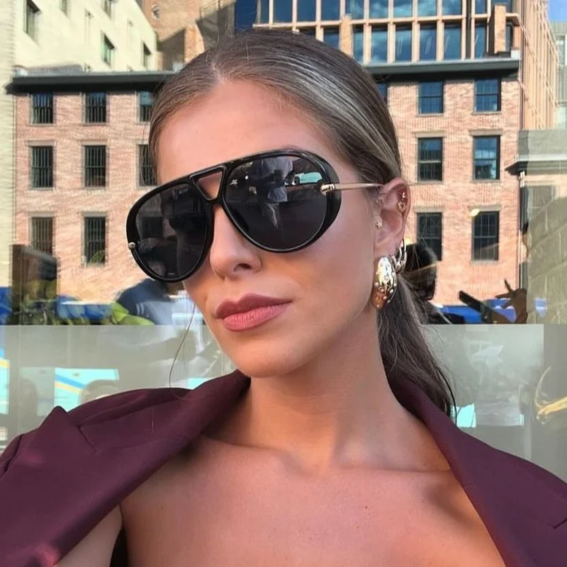 Dame Oversized solbriller med elegant plastramme og speilbelagte glass Luvikno