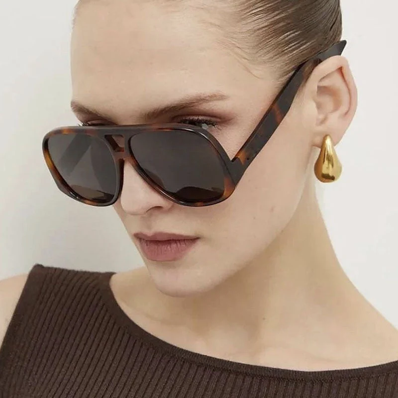 Dame moted sport-solbrille med robust ramme og UV-beskyttelse Luvikno