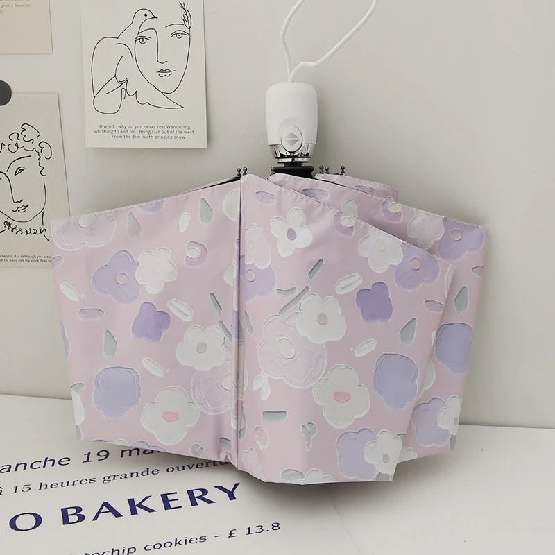 Dame sammenleggbar paraply med stilfullt blomstedesign Luvikno