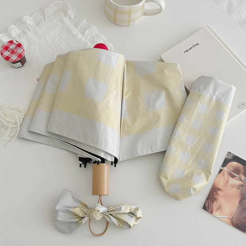 Dame sammenleggbart paraply med spesiell design Luvikno