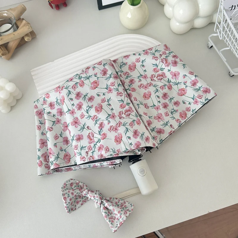 Dame sammenleggbare paraply med blomsterdesign og praktisk oppbevaringssystem Luvikno