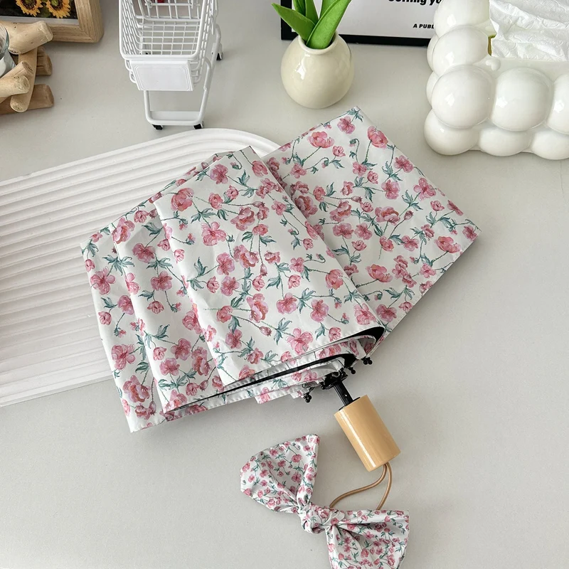 Dame sammenleggbare paraply med blomsterdesign og praktisk oppbevaringssystem Luvikno