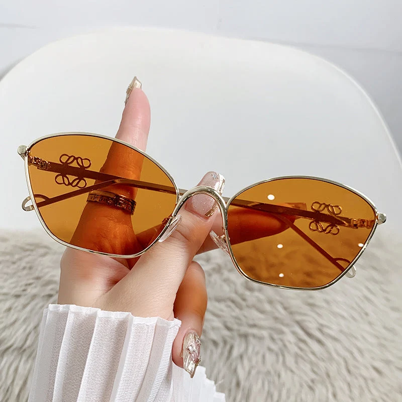 Dame moter Cat-Eye solbriller med filigran metallramme Luvikno