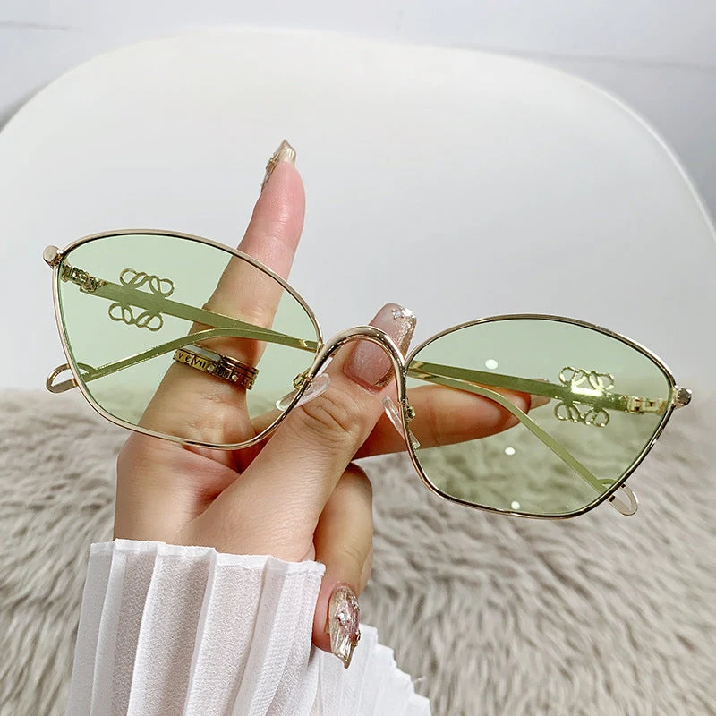 Dame moter Cat-Eye solbriller med filigran metallramme Luvikno