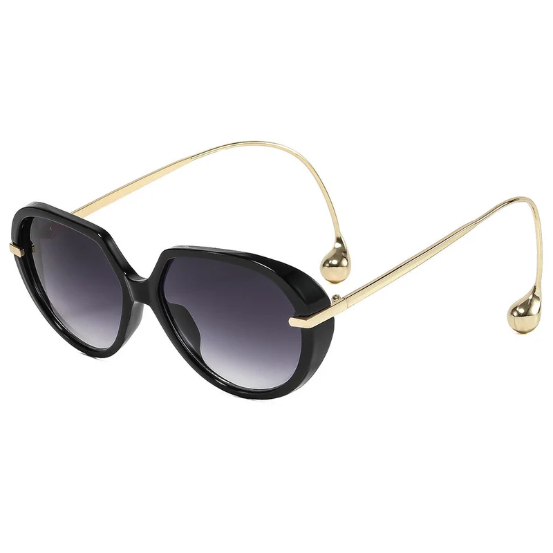 Dame cat-eye solbriller med gyldne detaljer og stilig ramme Luvikno