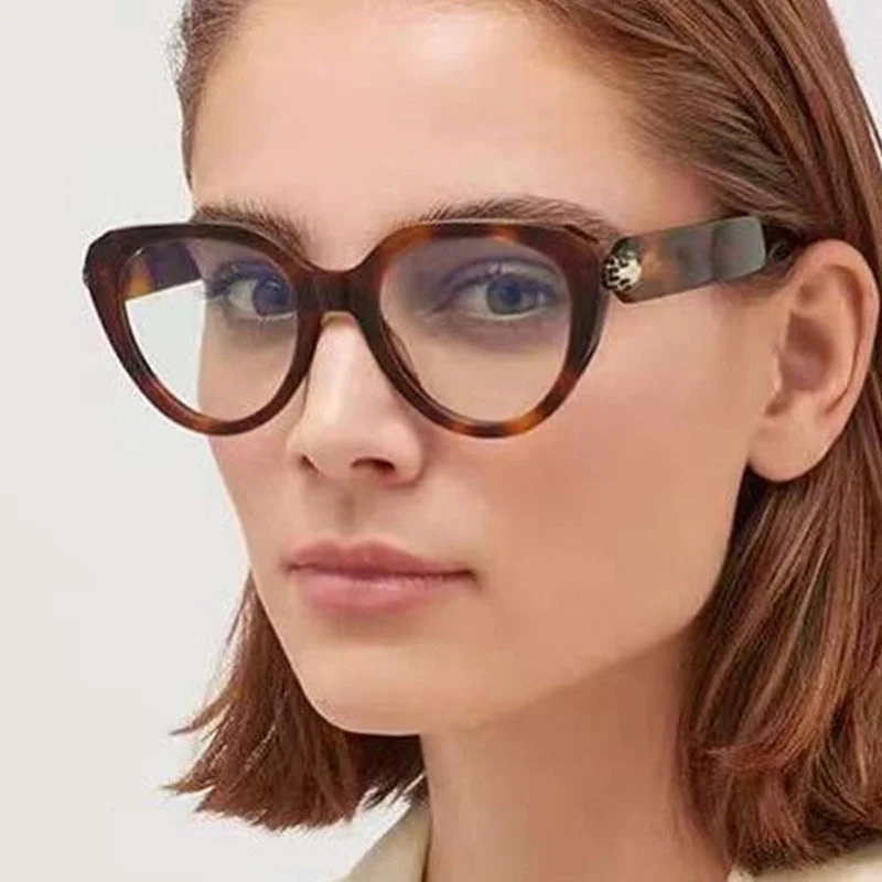 Dame Cat-Eye solbriller med gullige detaljer og beskyttende UV-filter Luvikno
