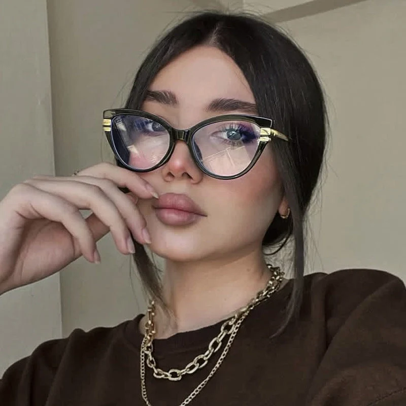 Dame Cat-Eye solbriller med elegant plastramme og gullaccentuer Luvikno